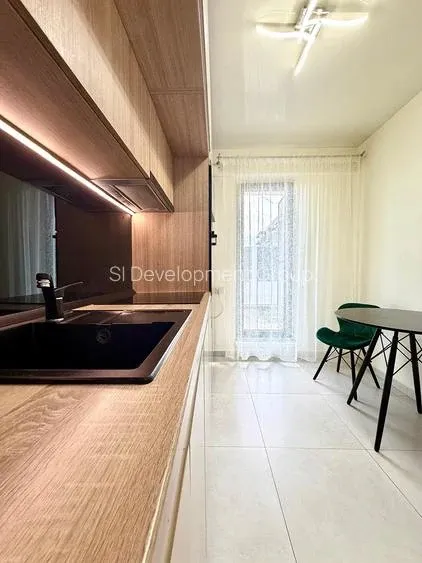 Apartament 2 camere de vanzare 56 mp+100 mp curte