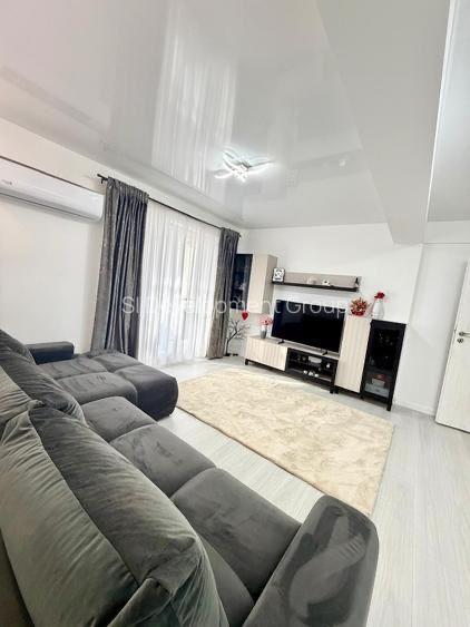 Apartament 2 camere 56 mp+100 mp curte de vanzare
