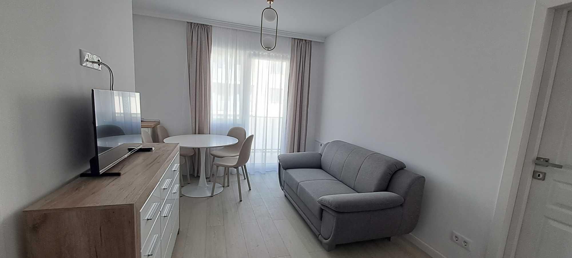 Inchiriez apartament cu o camera si dormitor separat