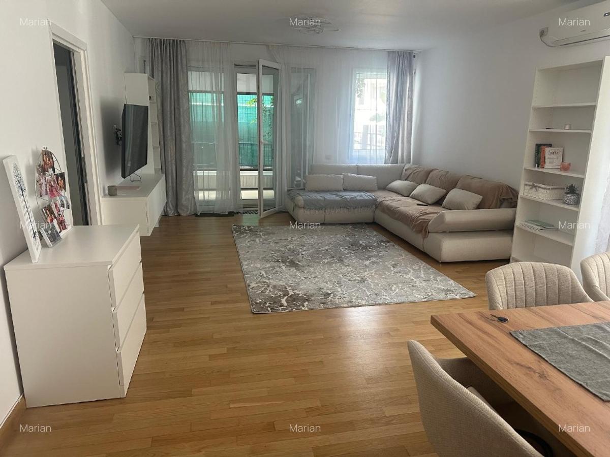 Apartament cu grădină generoasă, parcare subterană și boxă la 100 metri de parc