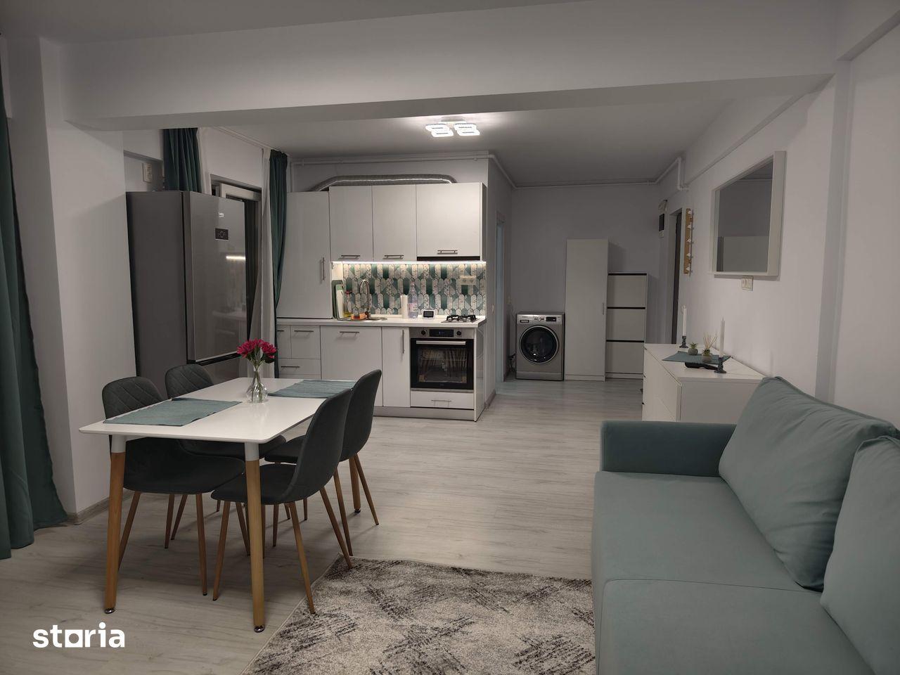 Apartament de 2 camere cu grădină și facilități complete - imagine 1