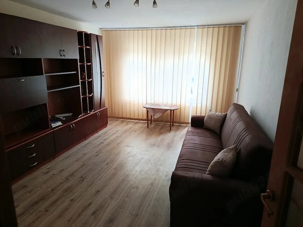 Închiriez apartament - imagine 1