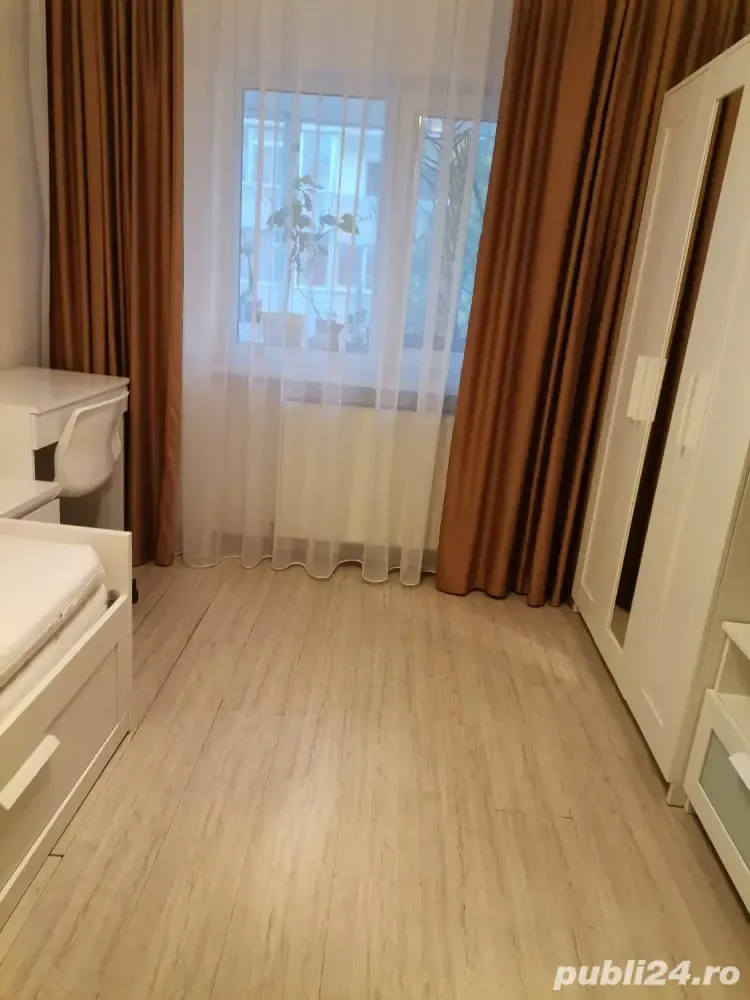 Închiriez cameră în apartament la un student nefumător in perioada anului universitar.