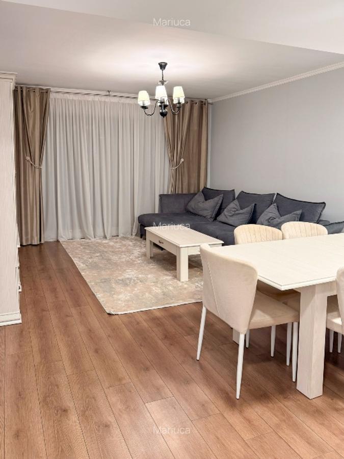 Apartament premium cu grădină proprie și două locuri de parcare.