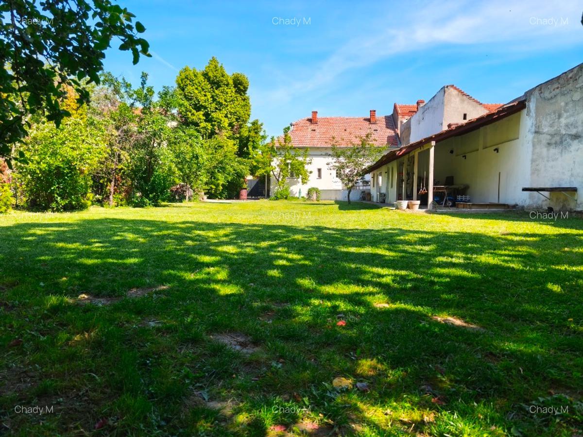 Casă de vânzare cu grădină amenajată (teren 722 m²)