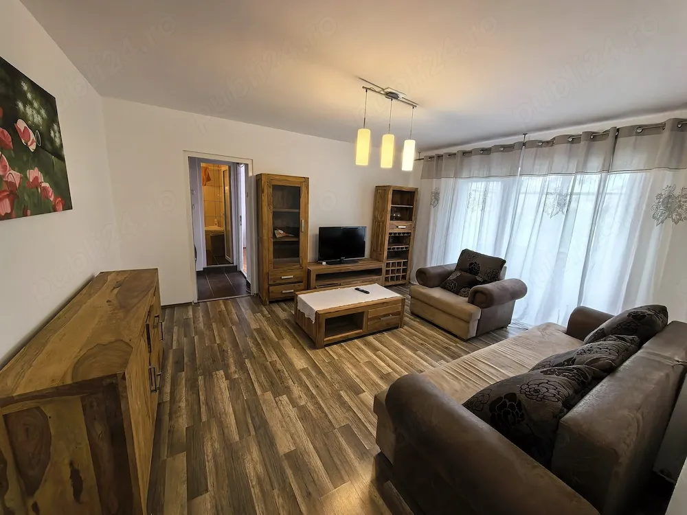 se inchiriaza apartament cu 3 camere cu loc parcare auto