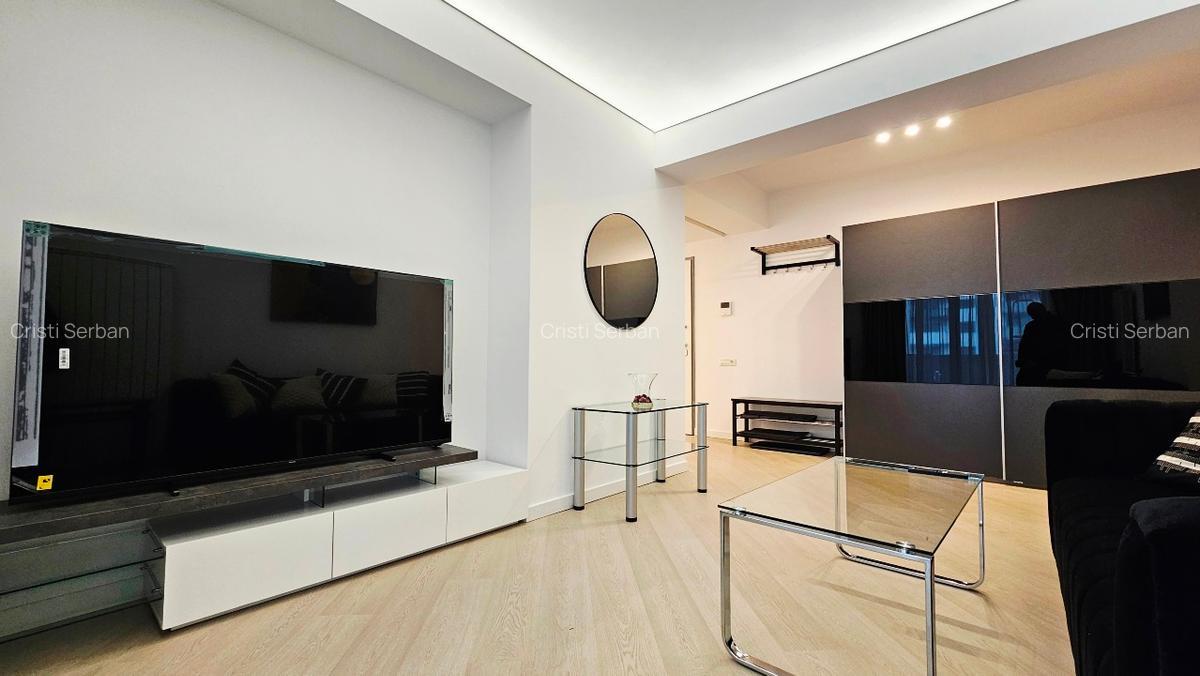 Ofer spre închiriere apartament 2 camere decomandat plus loc parcare subteran - imagine 1