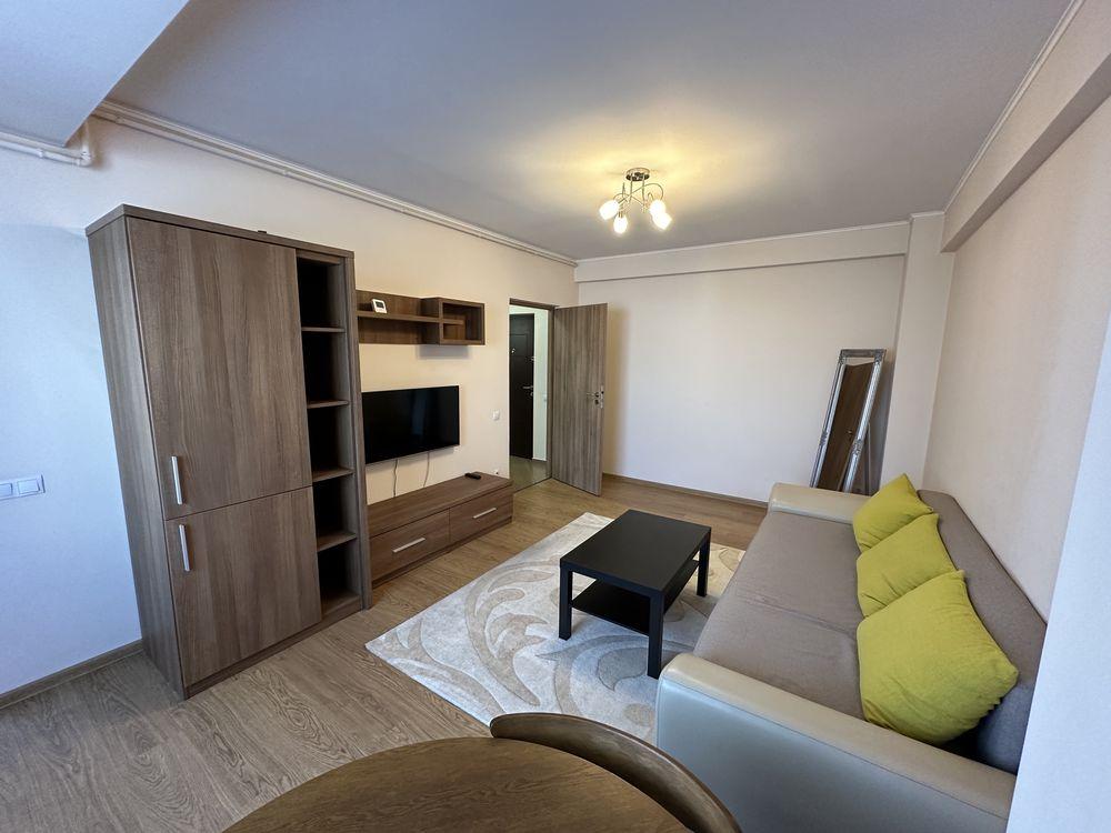 Inchiriez apartament 2 camere (studio) bloc nou cu parcare proprie