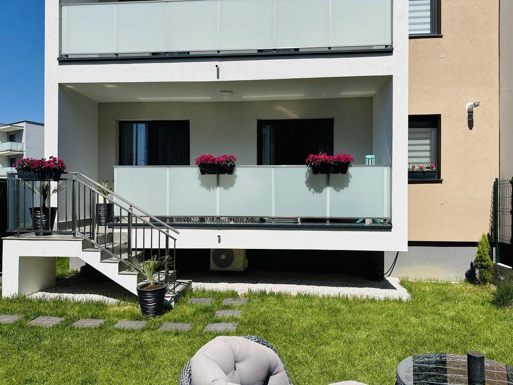 Apartament 2 camere + grădină proprie 70 mp + 2 locuri de parcare