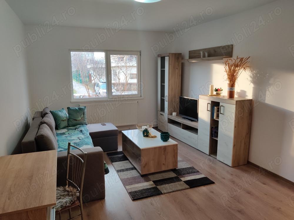 Inchiririez apartament 3 camere cu parcare, zona Tractorul - imagine 1