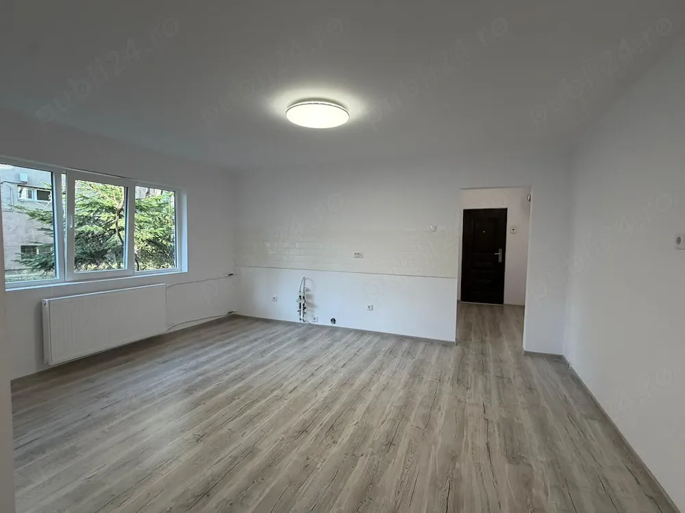 Apartament cu 2 dormintoare și living cu bucătărie open space - imagine 1