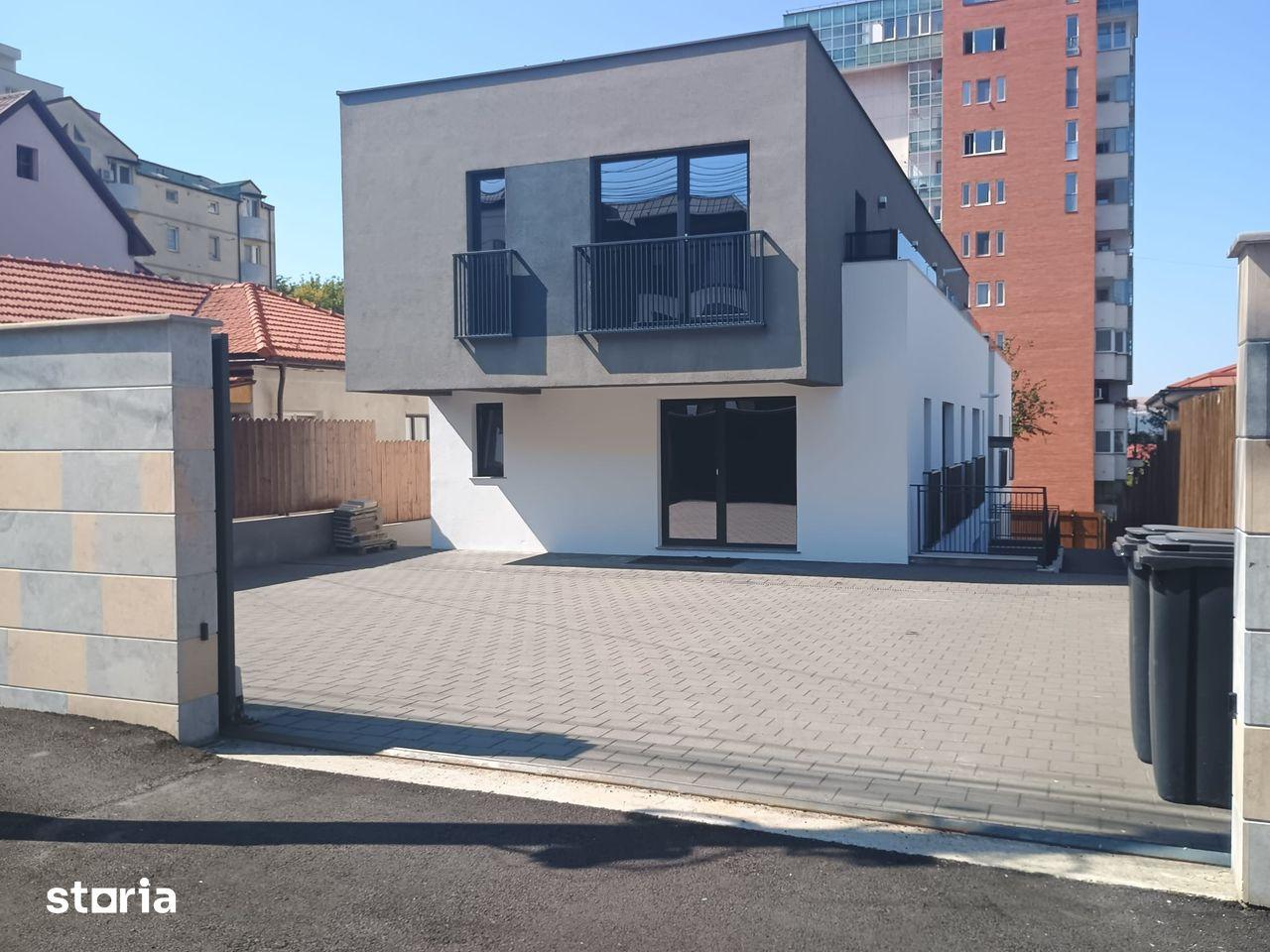Cladire moderna, superfinisata 500 mp, compus din 4 apartamente, teren