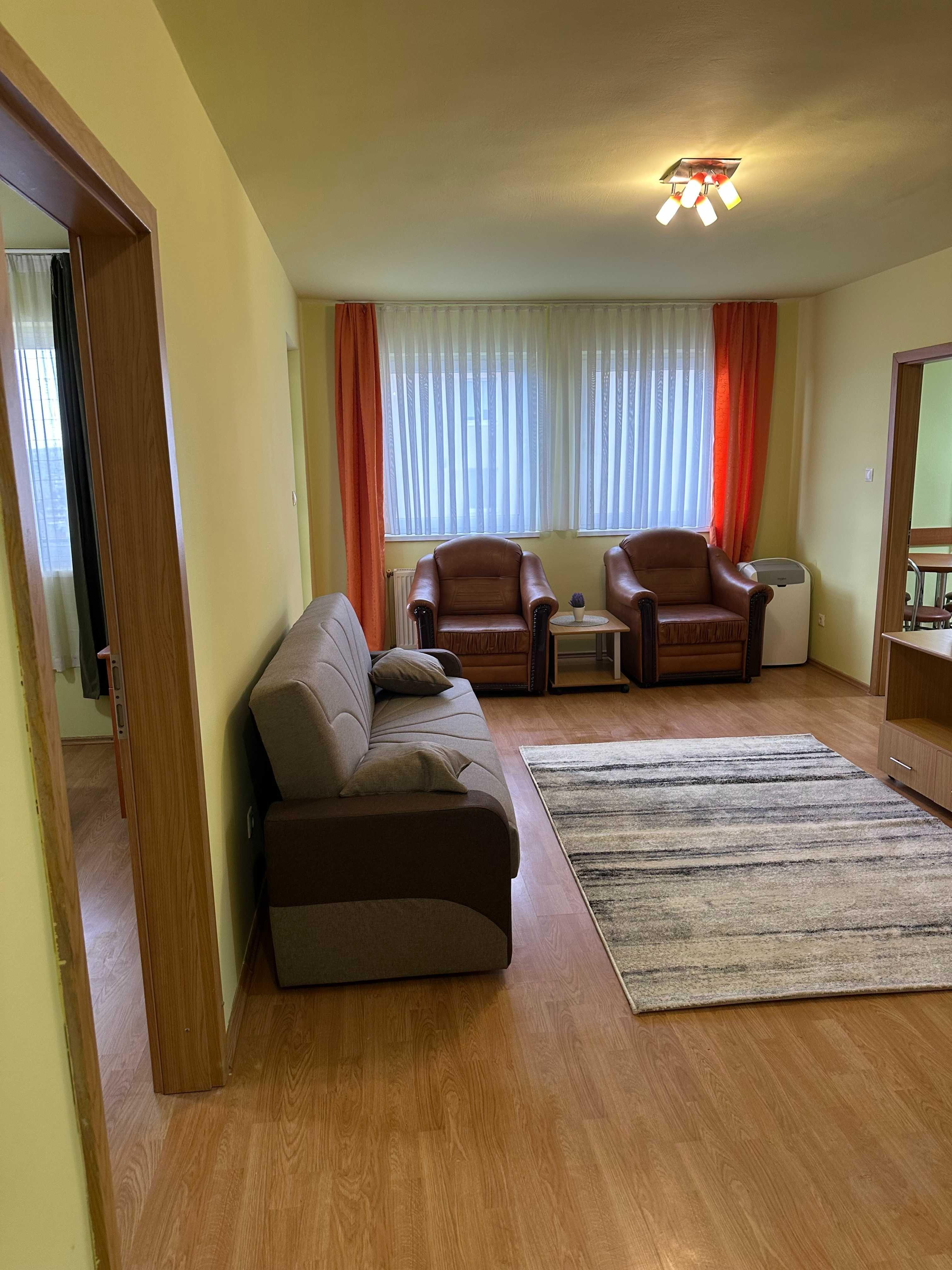 Inchiriez apapartament 2 camere complet mobilat si cu parcare subterana - imagine 1