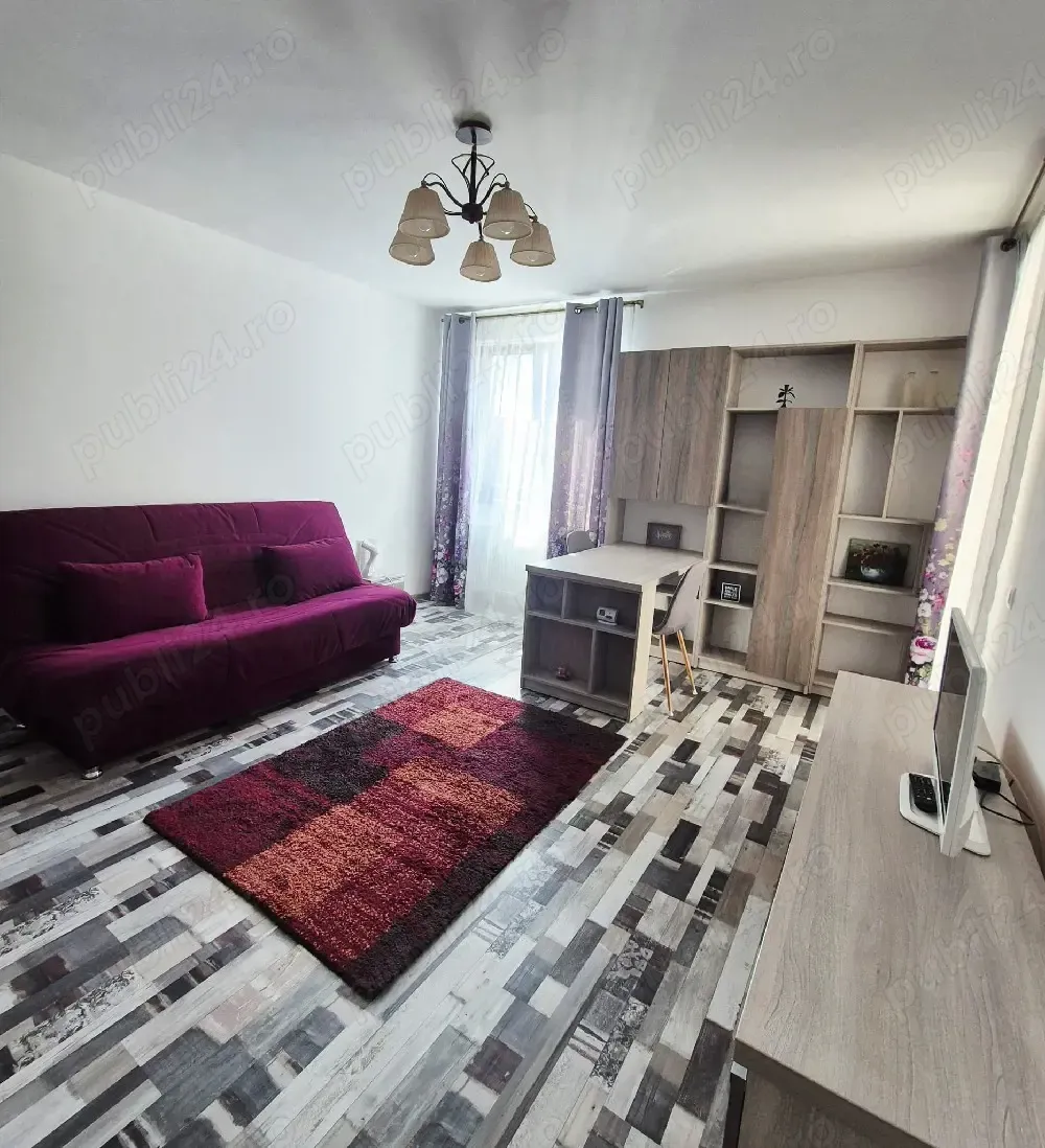 Garsonieră de închiriat cu loc de parcare propriu