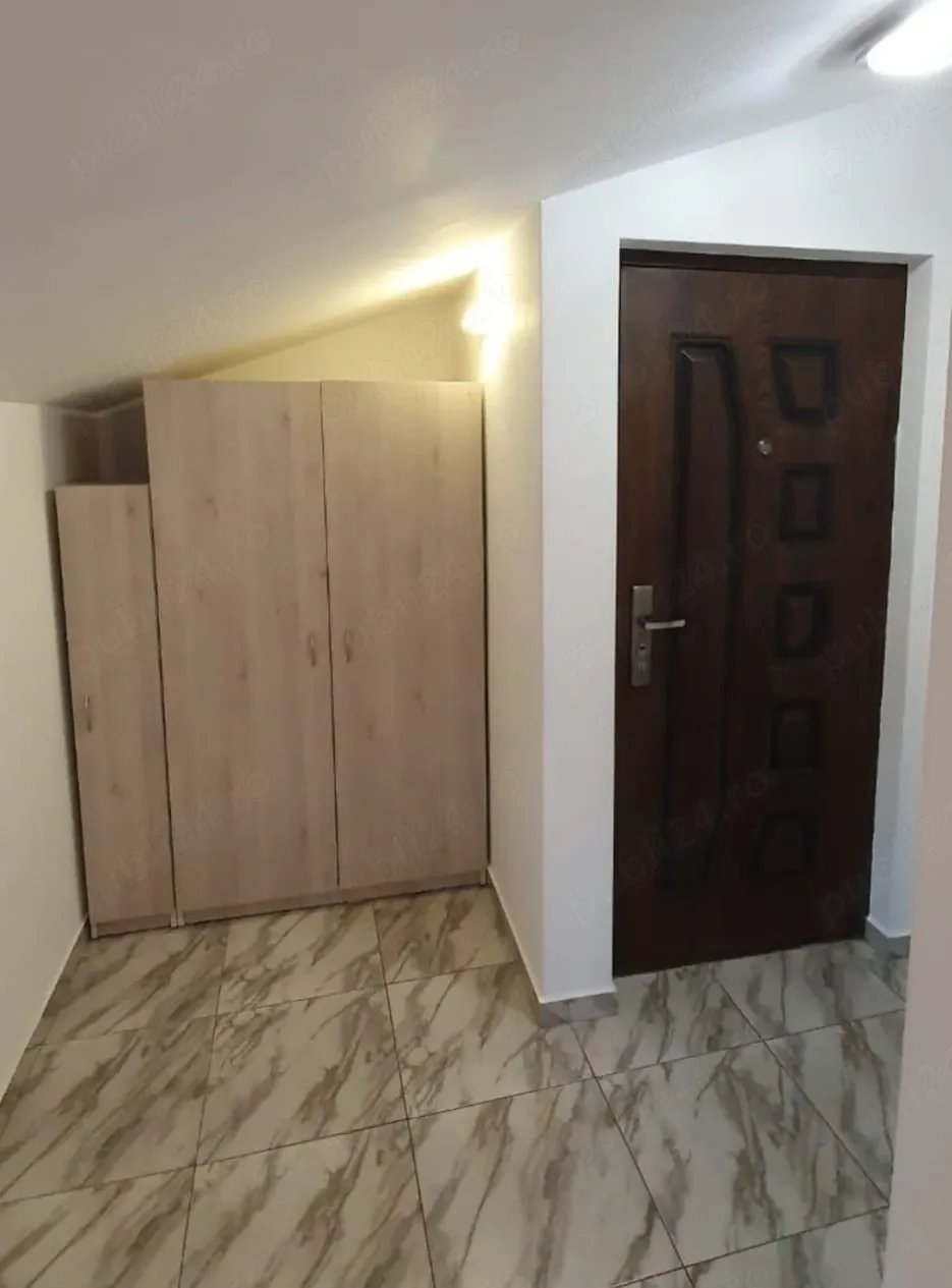 Garsoniera cu utilitati incluse