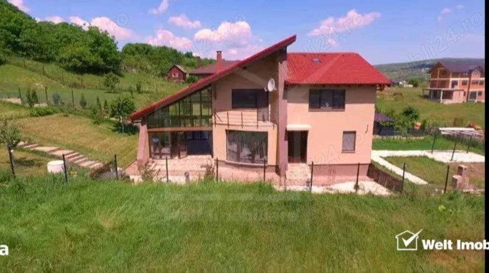 Casă de vânzare - imagine 1