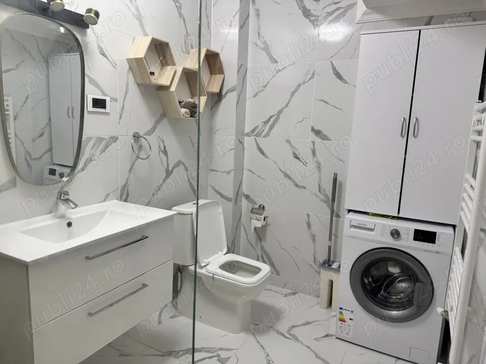 Ofer spre închiriere apartament 2 camere cu loc de parcare