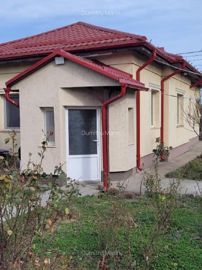 Teren 1700 mp, deschidere 18,40 ml, cu casa la strada principala - imagine 1