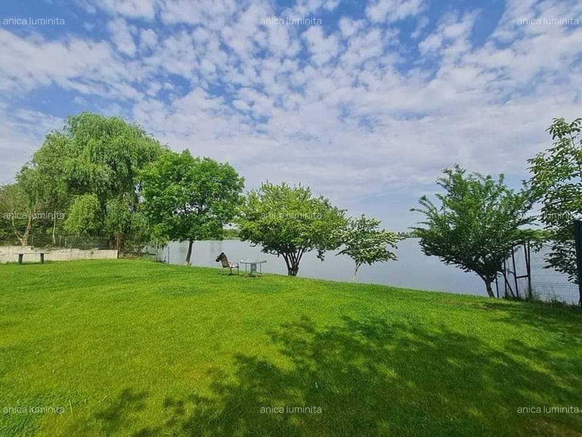 CASA PRESEI LAC  APARTAMENT CU GRADINA PE LAC LOCATIE UNICA