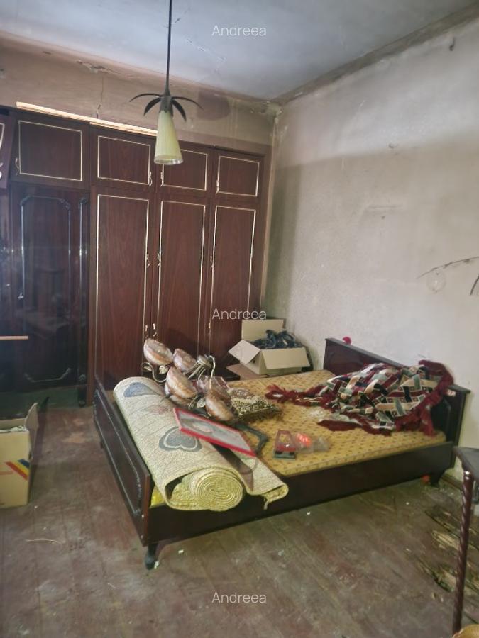 Casa de vanzare 3 canere 65 mp cu teren191 mp.
