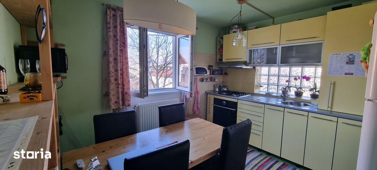 PF vând apartament 2 camere 58 mp, etaj 1 cu loc de parcare și curte