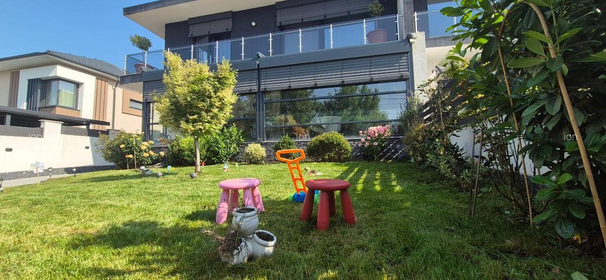Casa 5 camere, 3 bai, 3 locuri de parcare, teren 302 mp, Tunari, vedere la lac - imagine 1