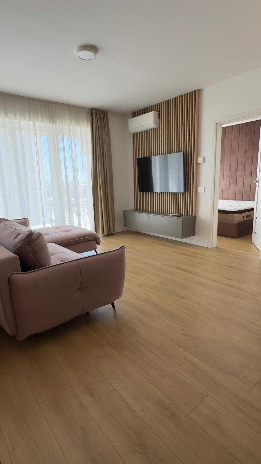 Inchiriez apartament 2 camere complet utilat, suprafata utila 52mp + balcon 7mp + loc de parcare