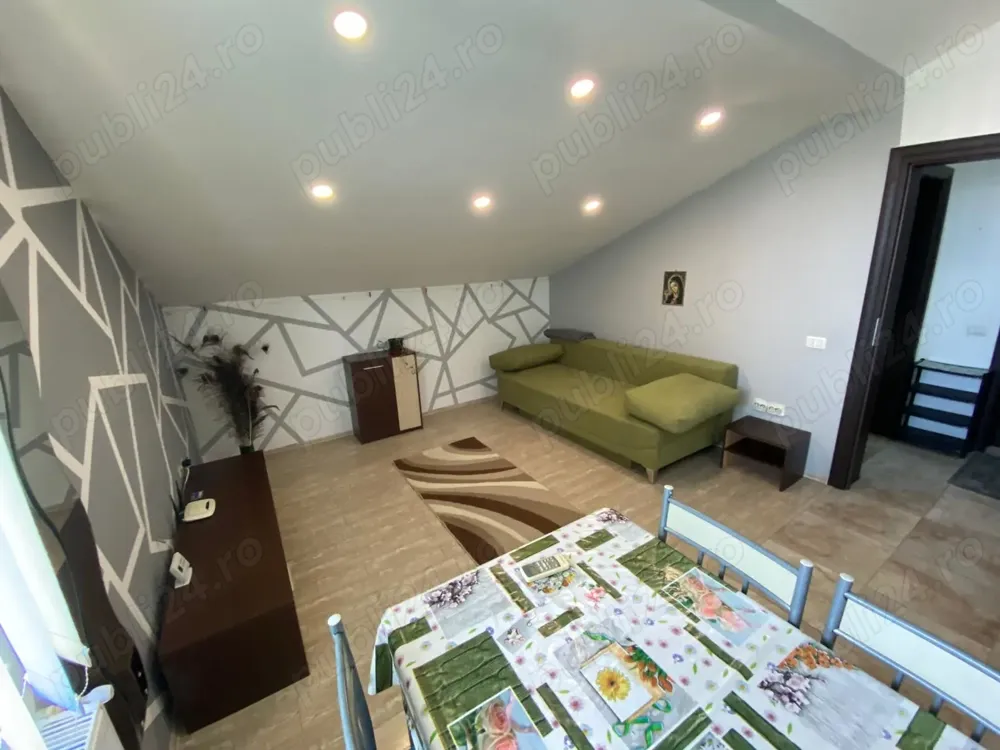 Închiriez apartament la mansarda - imagine 1